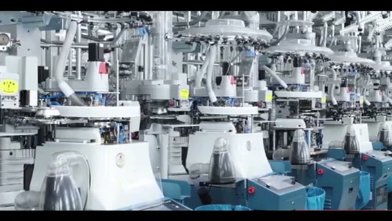 Knitting floor of a partner sock mill: automated sock-knitting machines with yarn creels